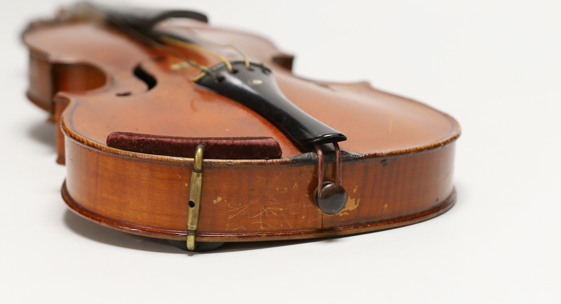 A cased 19th century French violin, back 34cm